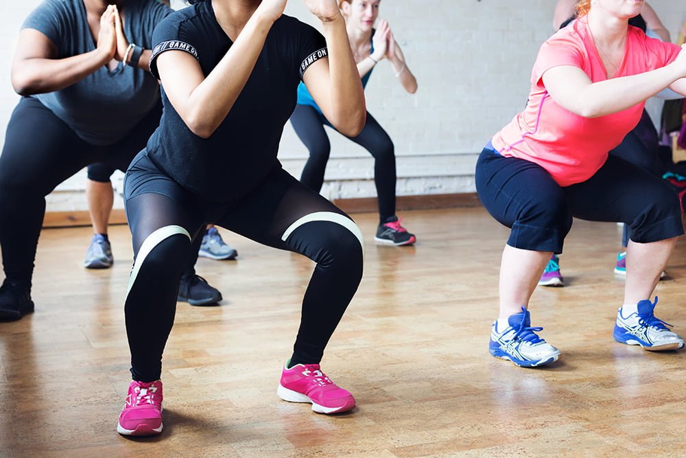 Séance Fessiers abdos en entreprise avec un coach sportif